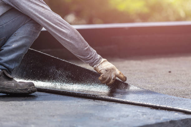 Professional Basement Waterproofing technician working in Bellona, NY